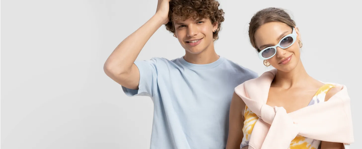 Two models modeling a t-shirt and crewneck