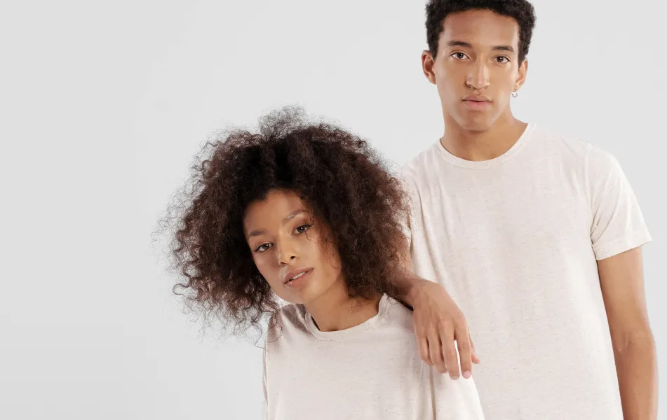 Two models modeling plain t-shirts