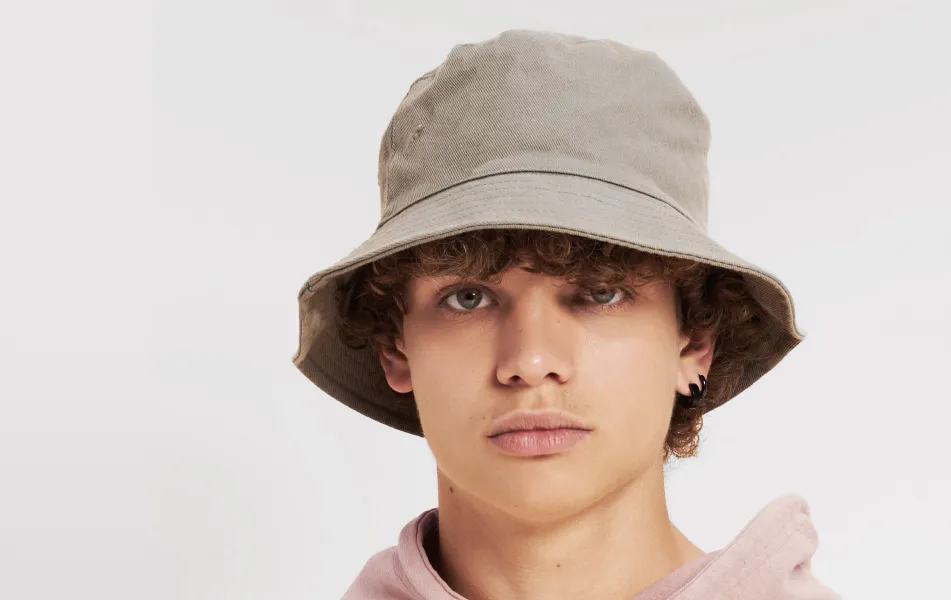 A male model modeling a bucket hat